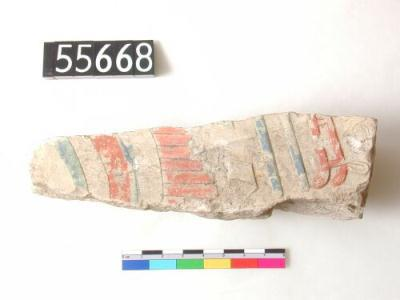 Fragment of limestone with painted relief from the Lahun pyramid complex: red and blue pigment surviving: vulture wing over hieroglyphs, with the title "mistress of the complete two lands", attested for queens in the Middle Kingdom. The element tm "complete" was first interpreted by Petrie as part of a name which he suggested reconstructing as Atum[neferu]. Lahun, Dynasty Eleven? (Jan Picton, contrib.)